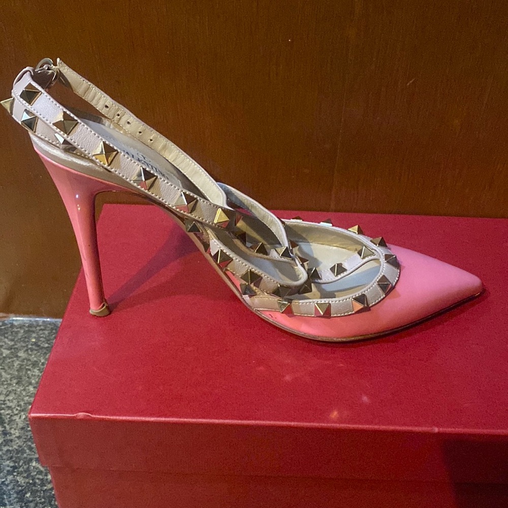 Valentino Rockstud patent leather pump with napa trim and platino Rockstuds.